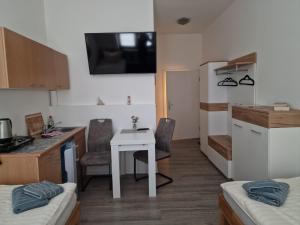 Kuchyň nebo kuchyňský kout v ubytování Unterkunft Greifswald