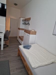 Postel nebo postele na pokoji v ubytování Unterkunft Greifswald