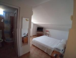 Postel nebo postele na pokoji v ubytování casa andrei m