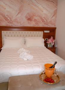 Postel nebo postele na pokoji v ubytování Monti 66 Hotel