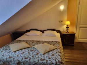 Krevet ili kreveti u jedinici u okviru objekta Taanilinna Hotell