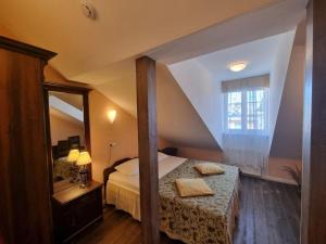 Krevet ili kreveti u jedinici u okviru objekta Taanilinna Hotell
