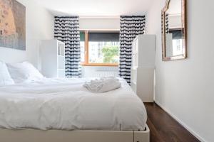 Voodi või voodid majutusasutuse Apartment Garden & Bed toas