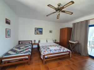 Postel nebo postele na pokoji v ubytování Sartivista Bed & Breakfast + 27 fotografií