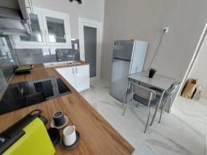 Kuchyň nebo kuchyňský kout v ubytování Casa Costera 1 lux apt