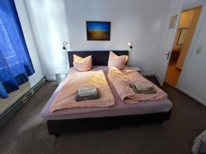 Ένα ή περισσότερα κρεβάτια σε δωμάτιο στο Großharzig GmbH