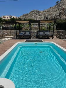 Bazén v ubytovaní Villa Poseidon Blue alebo v jeho blízkosti