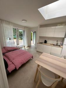 Postel nebo postele na pokoji v ubytování Red Travel Apartment