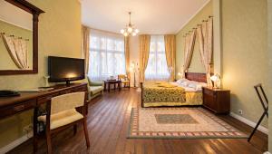 Krevet ili kreveti u jedinici u okviru objekta Taanilinna Hotell
