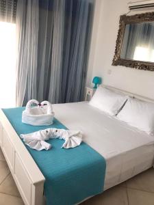 Posteľ alebo postele v izbe v ubytovaní Villa Poseidon Blue
