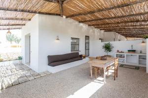 Posezení v ubytování Trullo Santovia