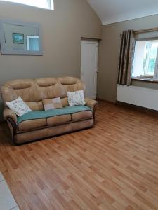 Area soggiorno di Danubio Guest Accommodation