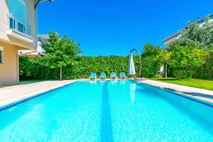 Imagine din galeria proprietății Paradise Town Villa Alison în Belek +55 fotografii