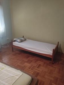 Postel nebo postele na pokoji v ubytování Ruža