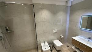Koupelna v ubytování Granda Hotel