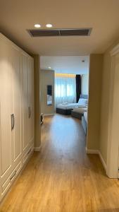 Postel nebo postele na pokoji v ubytování Granda Hotel