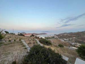 a view of a city from a hill at Salty Edge Holiday Home in Serifos Chora