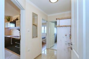 Ένα μπάνιο στο Appartement 1 Zaton beach mit Terrasse und Grill hochmodern und Strandnah +16 φωτογραφίες