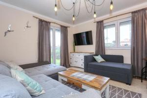 Χώρος καθιστικού στο Appartement 1 Zaton beach mit Terrasse und Grill hochmodern und Strandnah