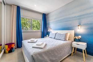 Ένα ή περισσότερα κρεβάτια σε δωμάτιο στο Emerson Plaza stunning 2 bedroom apartment with sea view +48 φωτογραφίες