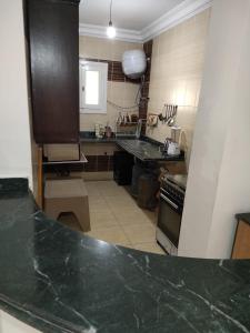 Кухня или мини-кухня в Chalet Marseilia beach 3 شالية غرفتين في مارسيليا بيتش
