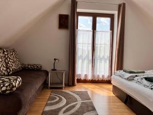 A bed or beds in a room at AnnApartman
