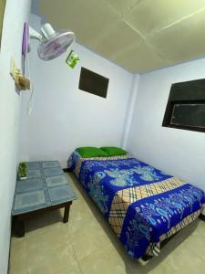 מיטה או מיטות בחדר ב-ijen basecamp
