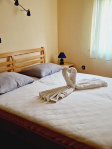 Cama ou camas em um quarto em Guest House Sombrero