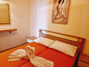 Cama ou camas em um quarto em Guest House Sombrero