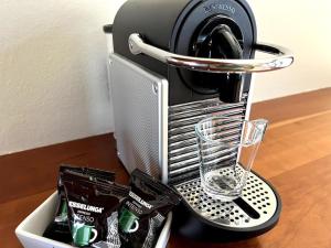 Kaffee-/Teezubehör in der Unterkunft Attico in Piazza Matteotti