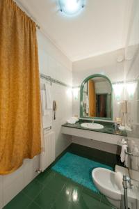 Kylpyhuone majoituspaikassa Hotel Villa Giulia