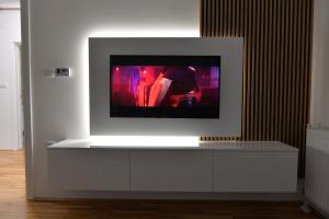 Μια τηλεόραση ή/και κέντρο ψυχαγωγίας στο HM Apartments