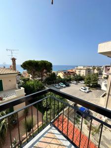 a balcony with a view of a parking lot at Ametista Rooms Tropea in Tropea