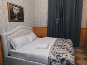A bed or beds in a room at cattaneo accomodation