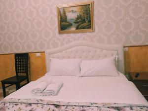 Tempat tidur dalam kamar di cattaneo accomodation