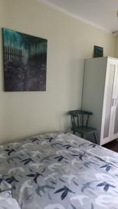 Posteľ alebo postele v izbe v ubytovaní Global Trip Apartament stadion zimowy