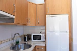 Kuchyň nebo kuchyňský kout v ubytování Apartamento Marina de Torrox