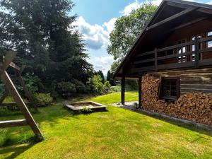 Um jardim em log cabin in Czech-Saxon Switzerland