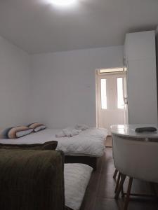 Postel nebo postele na pokoji v ubytování Apartment Happy