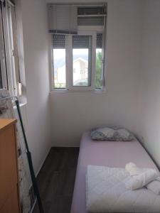 Postel nebo postele na pokoji v ubytování Apartment Happy