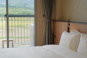Postel nebo postele na pokoji v ubytování inami B&B