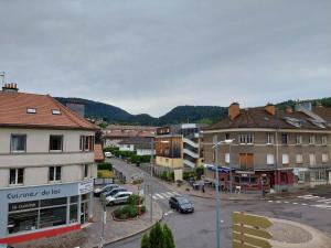 an aerial view of a town with buildings and a street at L'escale du centre du lac de Gérardmer in Gérardmer