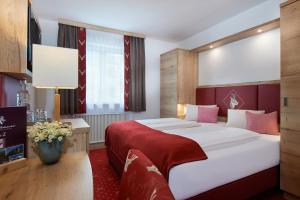 Postel nebo postele na pokoji v ubytování Hotel Kerschbaumer