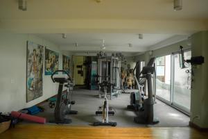 a gym with several treadmills and exercise bikes at ISLA SIMCA 