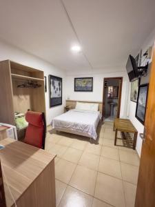 Cama o camas de una habitación en ApartHotel Maison Suisse