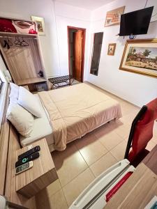 Cama o camas de una habitación en ApartHotel Maison Suisse