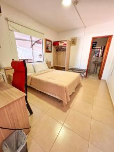 Cama o camas de una habitación en ApartHotel Maison Suisse