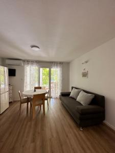 Posedenie v ubytovaní Apartments Villa Ohana