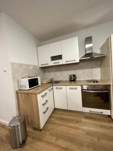 Kuchyňa alebo kuchynka v ubytovaní Apartments Villa Ohana