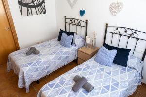 Postel nebo postele na pokoji v ubytování Apartamento Marina de Torrox